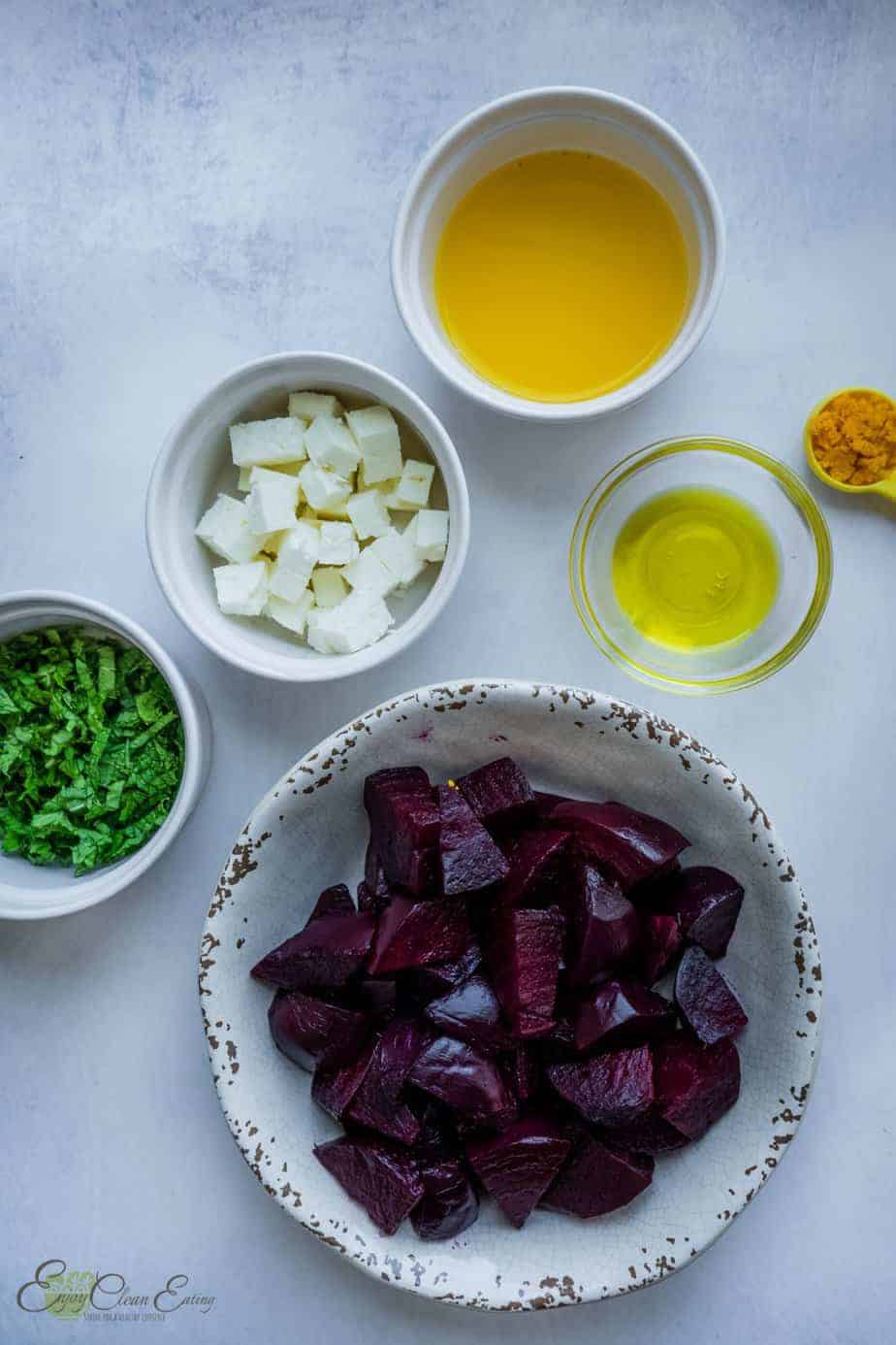 ingredients to make beet salad all measure and in bowls