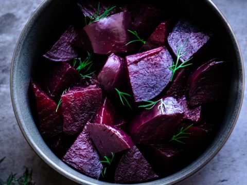Choopped beets in a bowl after pressure cooking in the instant pot