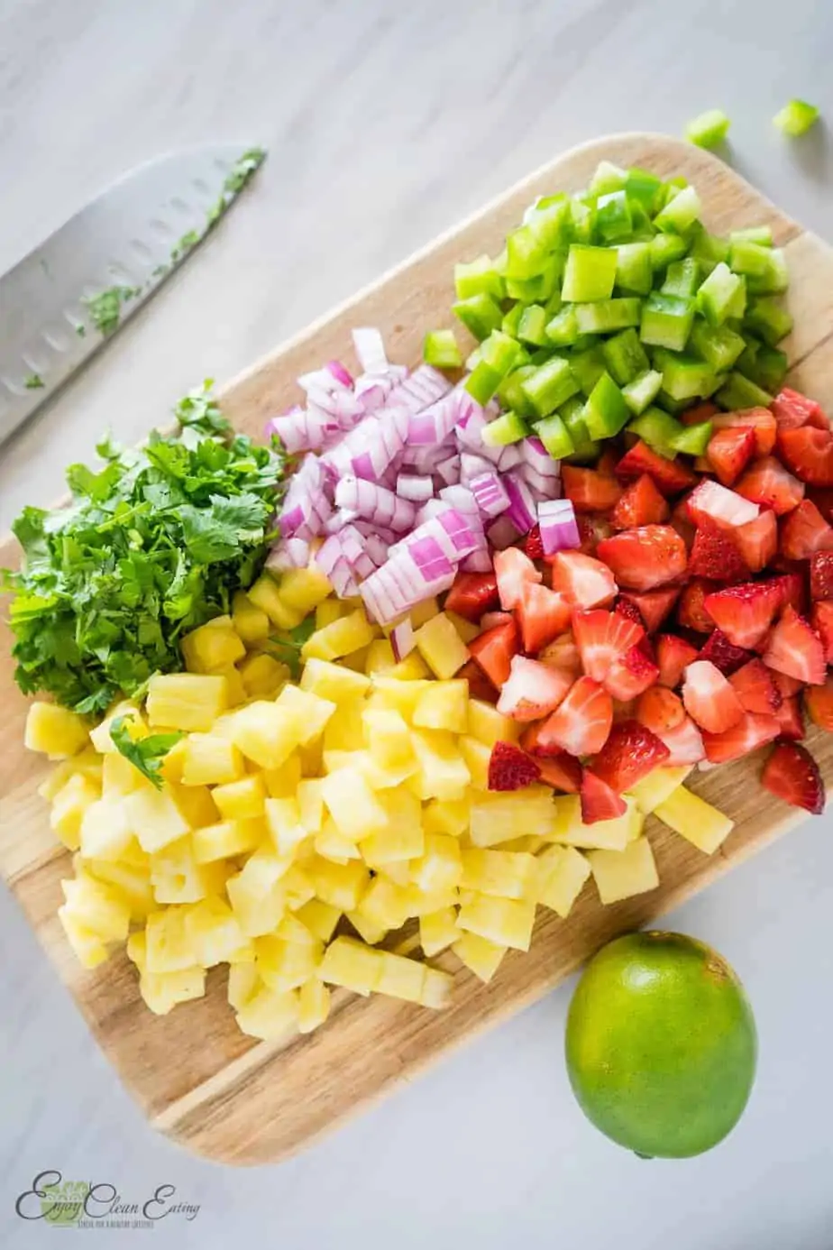 diced fruits and vegetables to make strawberry pineapple salsa
