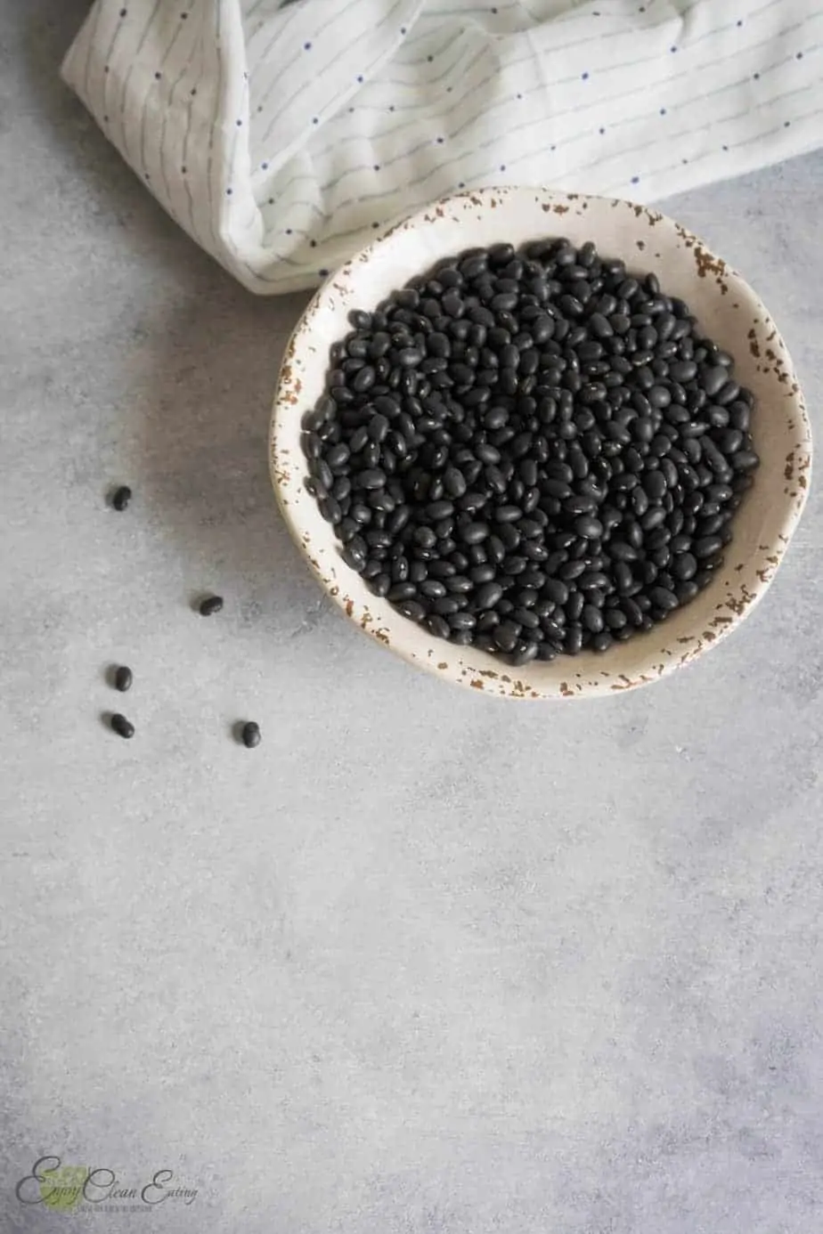 The main ingredient for this recipe dry black beans in a bowl.
