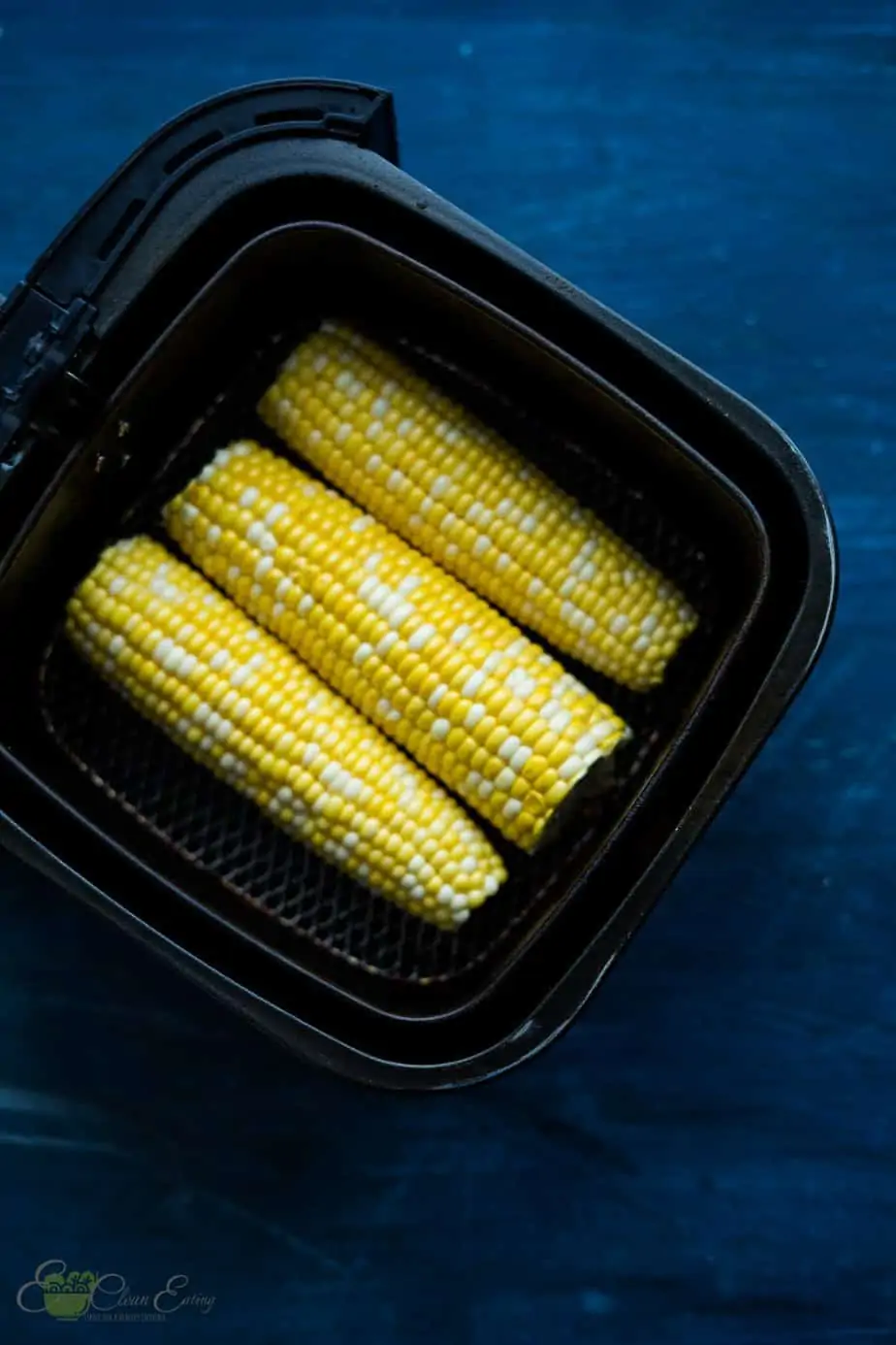 corn on the corn inside the air fryer basket