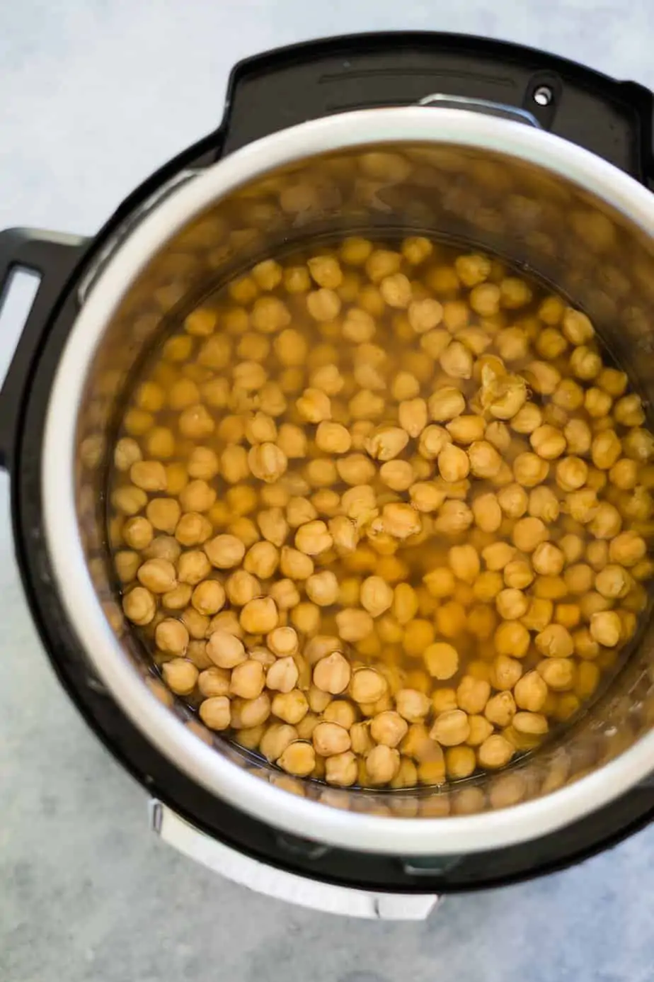cooked chickpeas inside the instant pot after naturally the pressure.