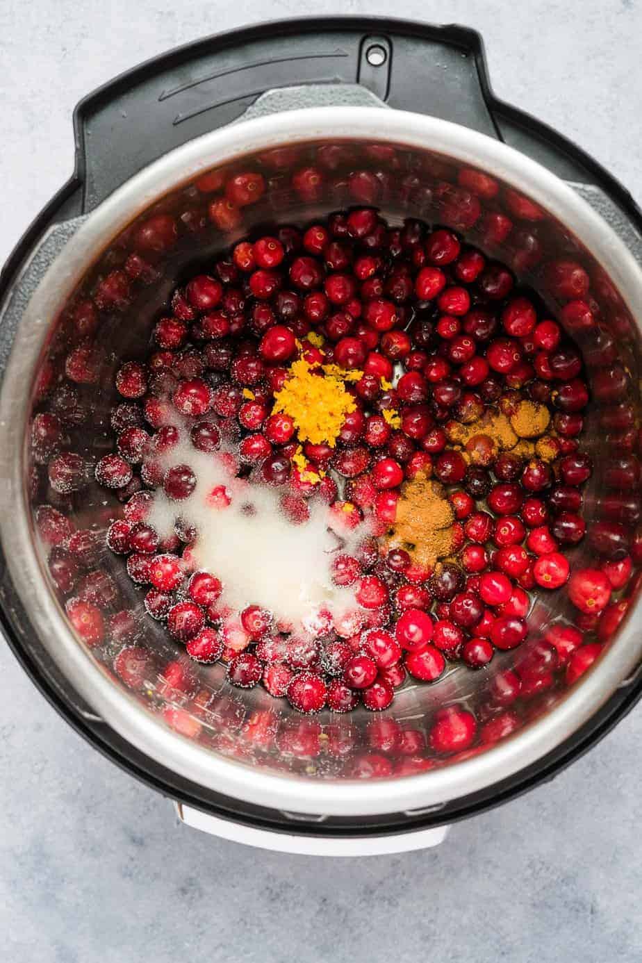 cranberry sauce in instant pot. the ingredients inside the inner pot