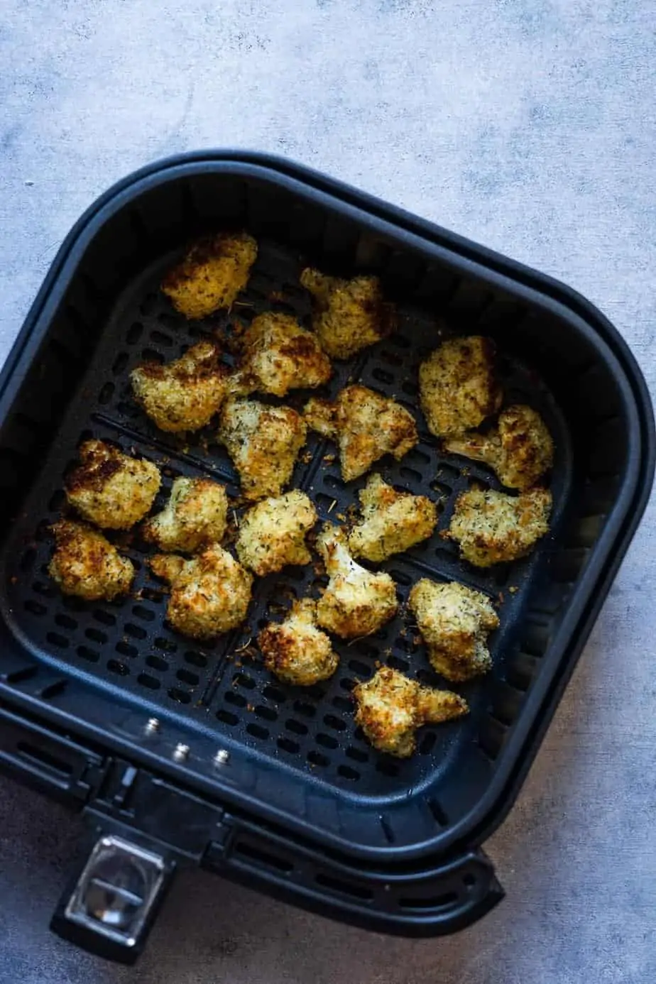 perfectly crispy cauliflower after roasting in the hot air fryer