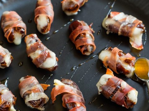 Prosciutto wrapped dates with drizzle of honey