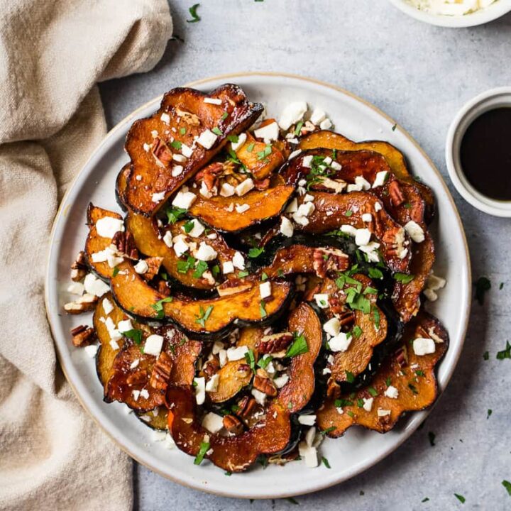 Air fryer acorn squash, top with feta cheese and dipping sauce.