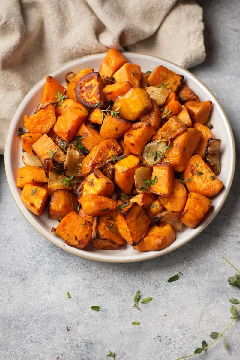 roasted sweet potatoes serve with fresh thyme.