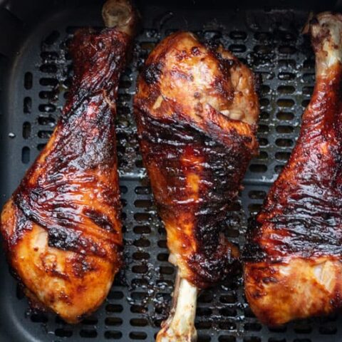 perfectly cook air fryer Turkey legs inside the air fryer basket.