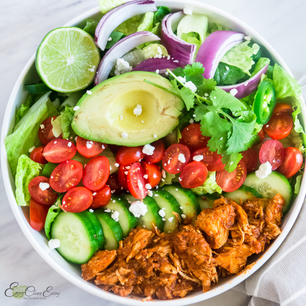 Chicken tinga made in the instant pot salad bowl.