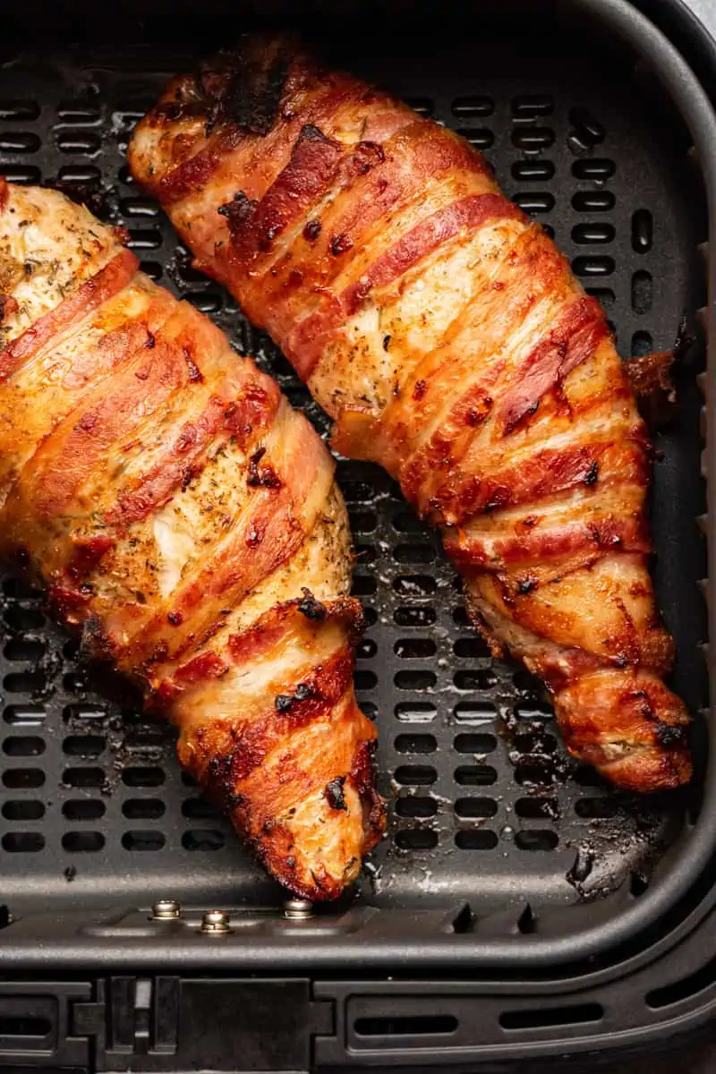 Carnivore recipes, cooked bacon wrapped turkey tenderloin in the air fryer basket.