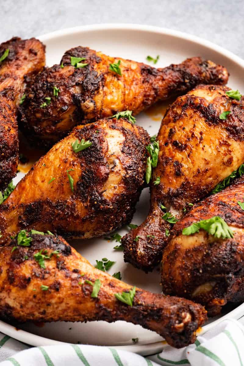 Spicy chicken in the air fryer sprinkles with fresh parsley.