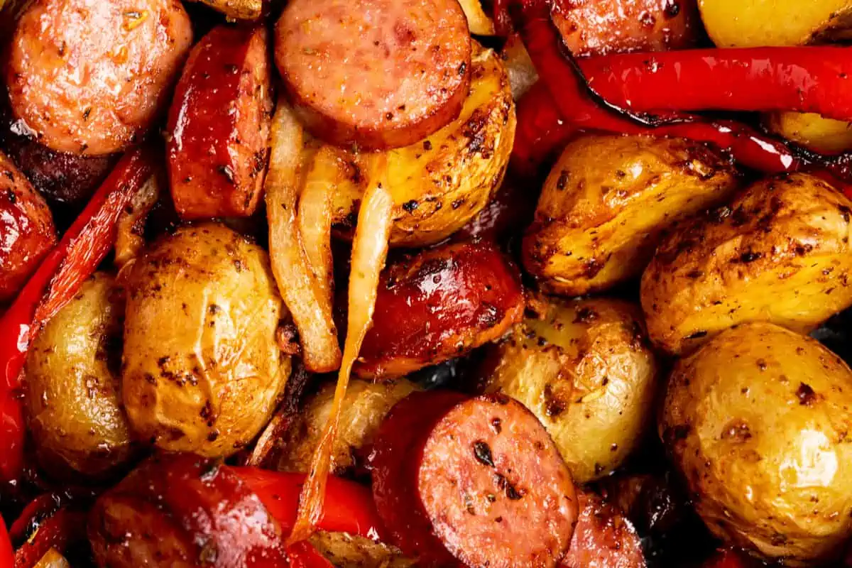 Crispy potatoes and sausage with onion and bell pepper.