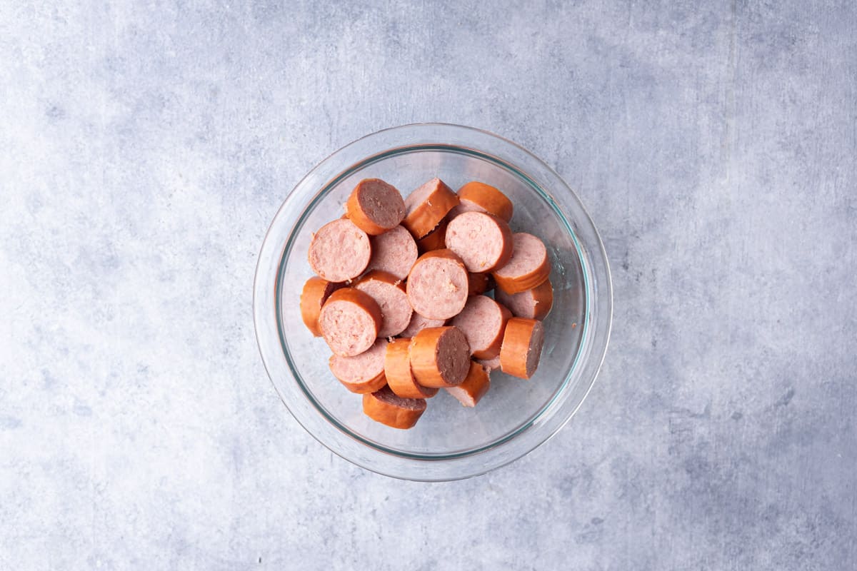 cut sausage in a bowl.