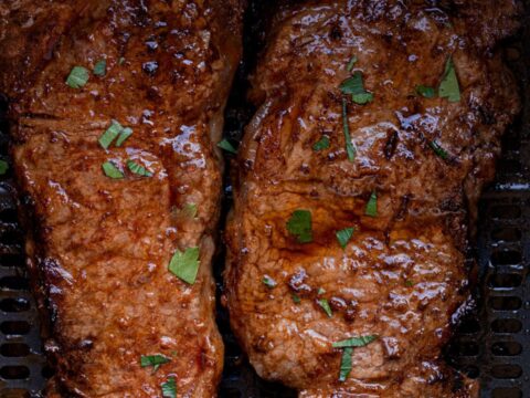 juicy new york strip steak cooked in the air fryer