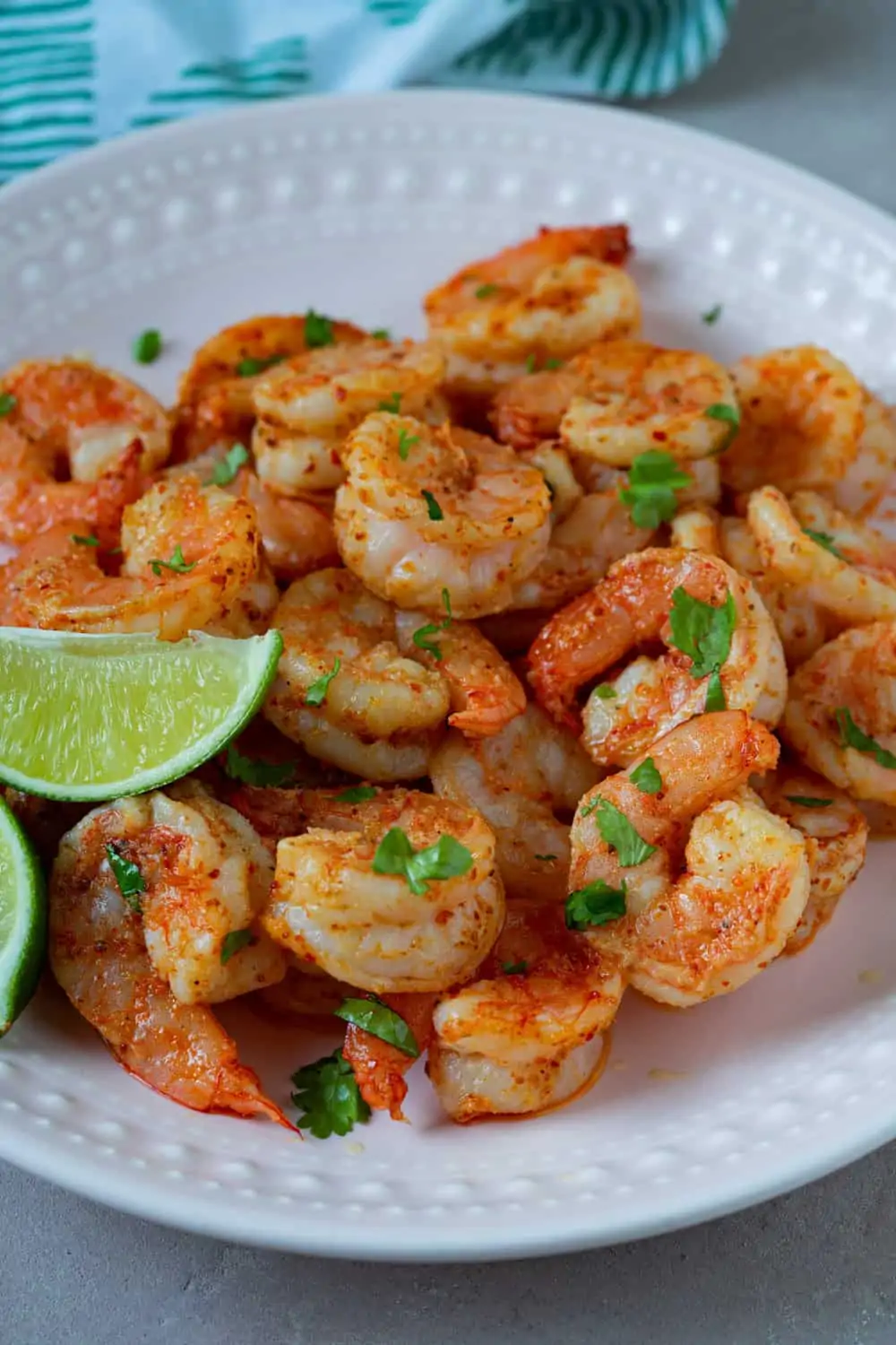 Air fried jumbo shrimp served with parsley and lime.