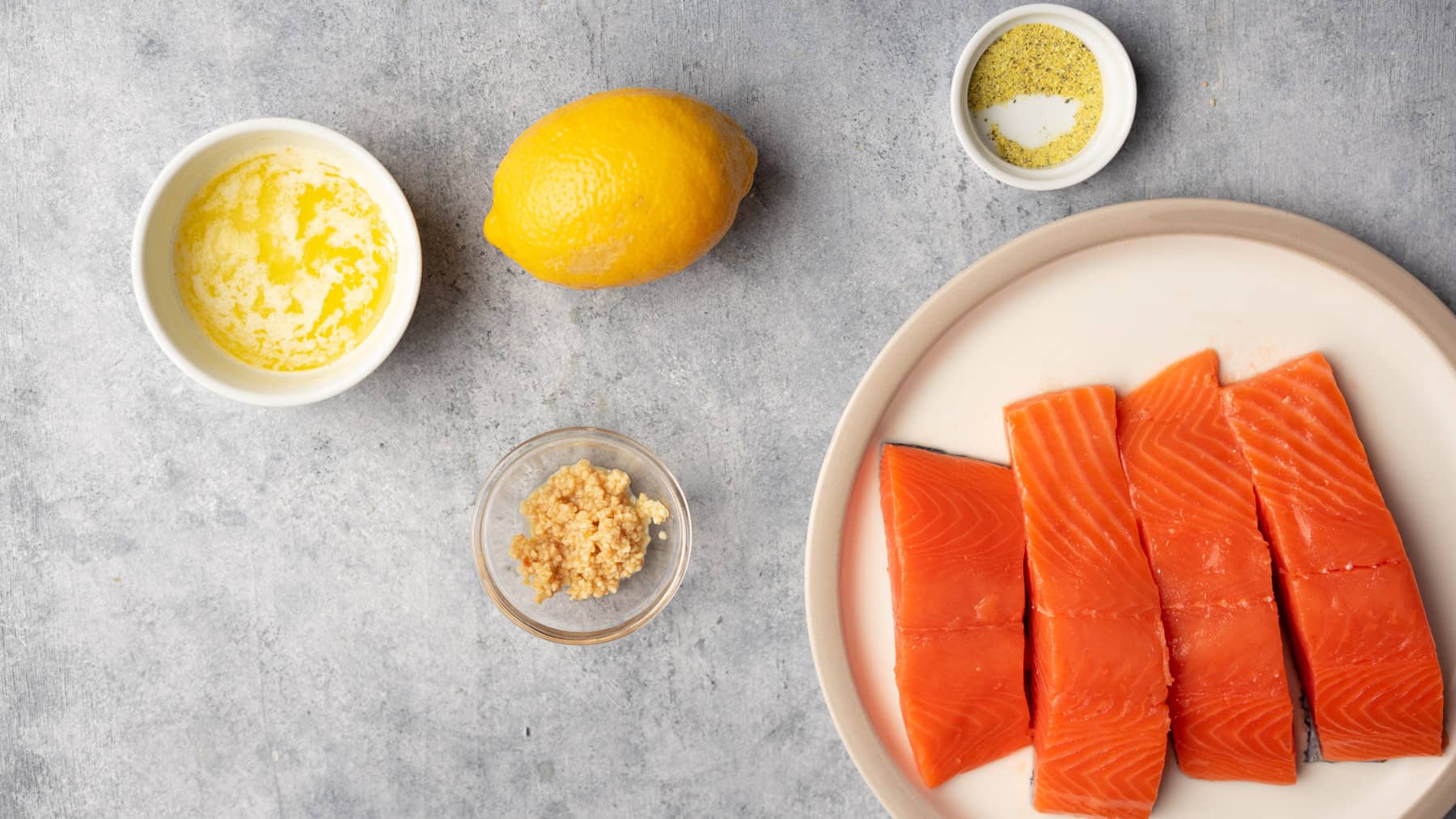 Ingredients to make lemon pepper salmon.