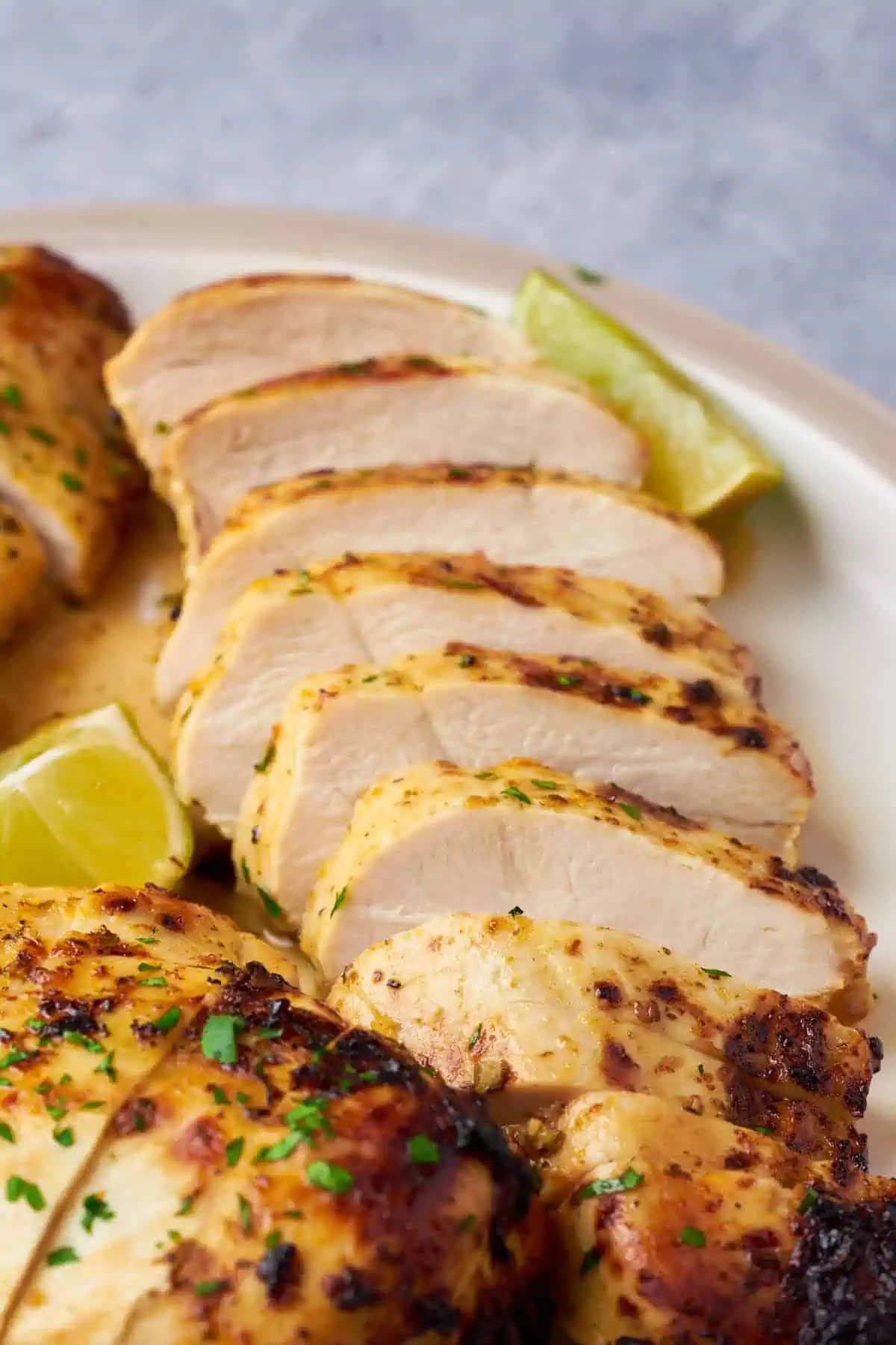 Sliced juicy marinated chicken breast after cooking.