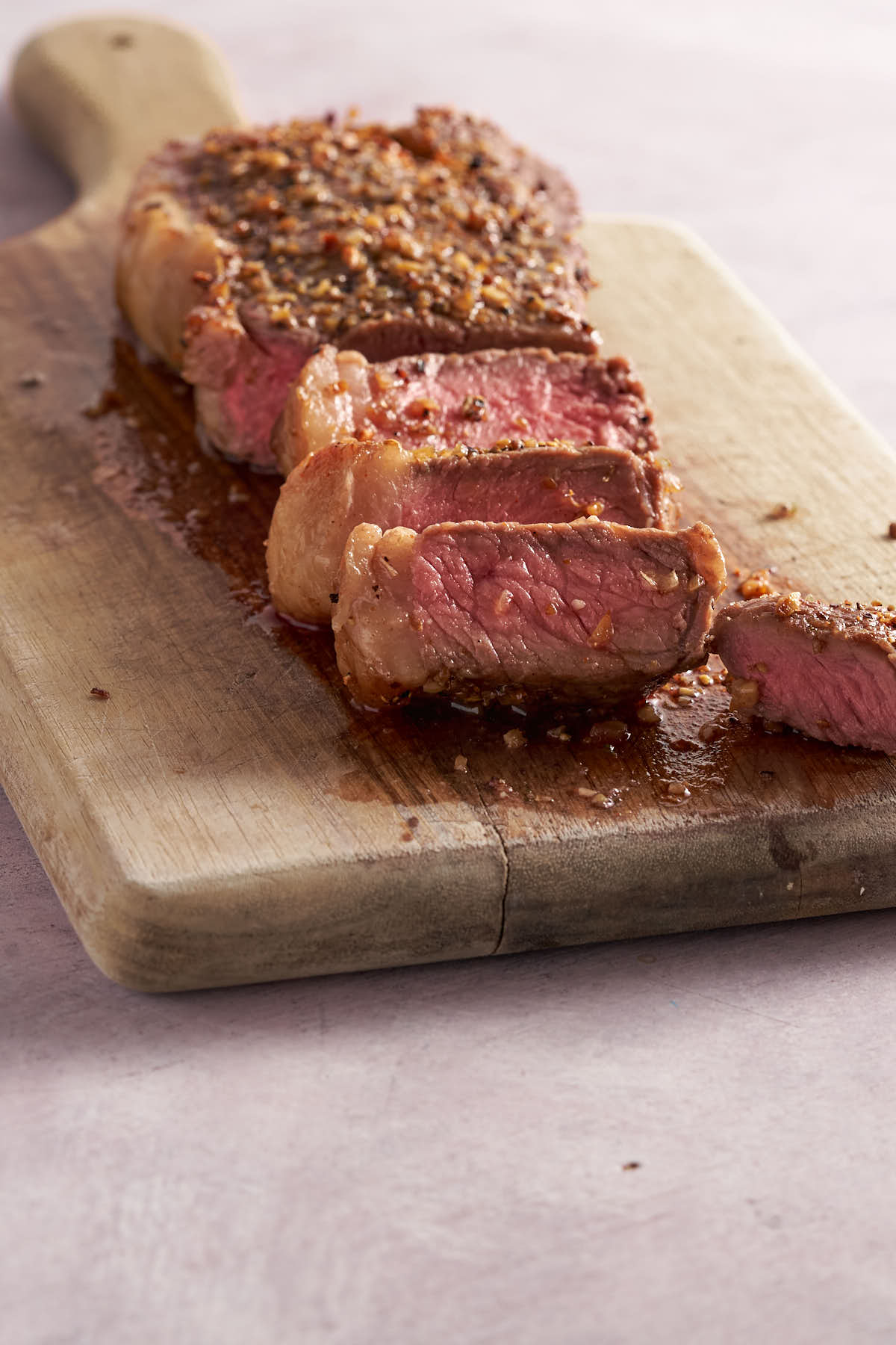juicy fresh medium rare strip steak after cooking in the air fryer