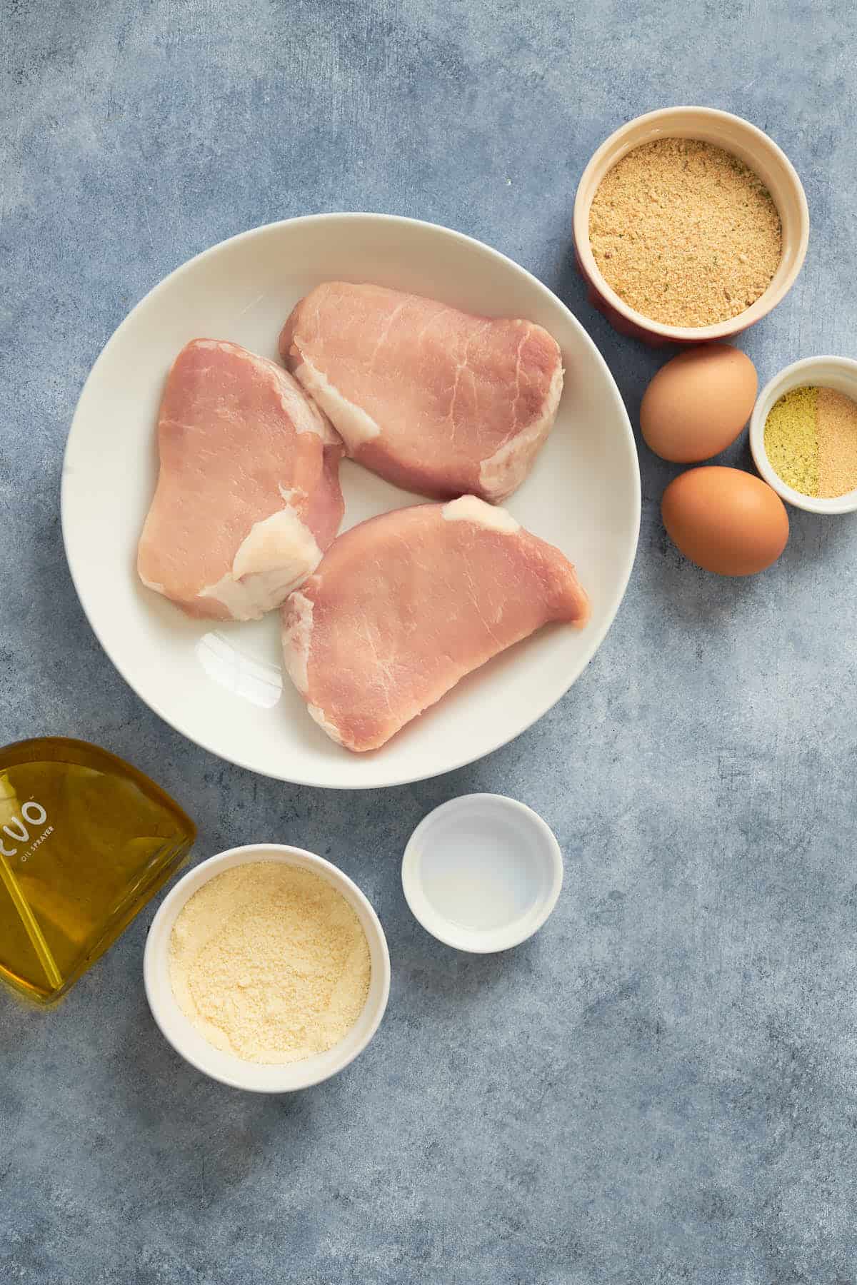 Ingredients to make breaded pork chops.