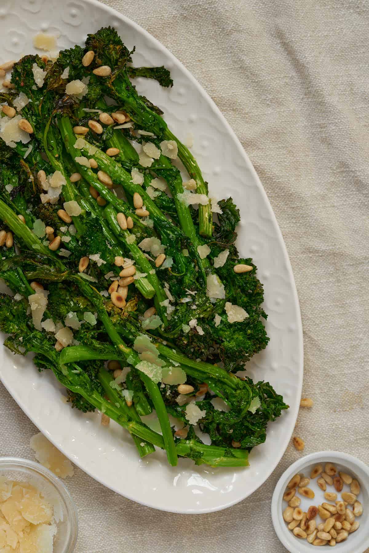 Air fried broccoli rabe served with cheese, lemon, and toasted pine nuts.