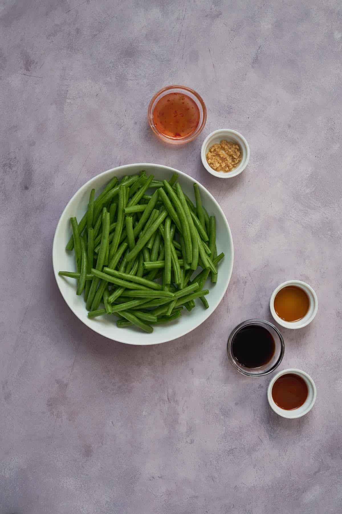 Ingredients to make spicy air fryer green beans.
