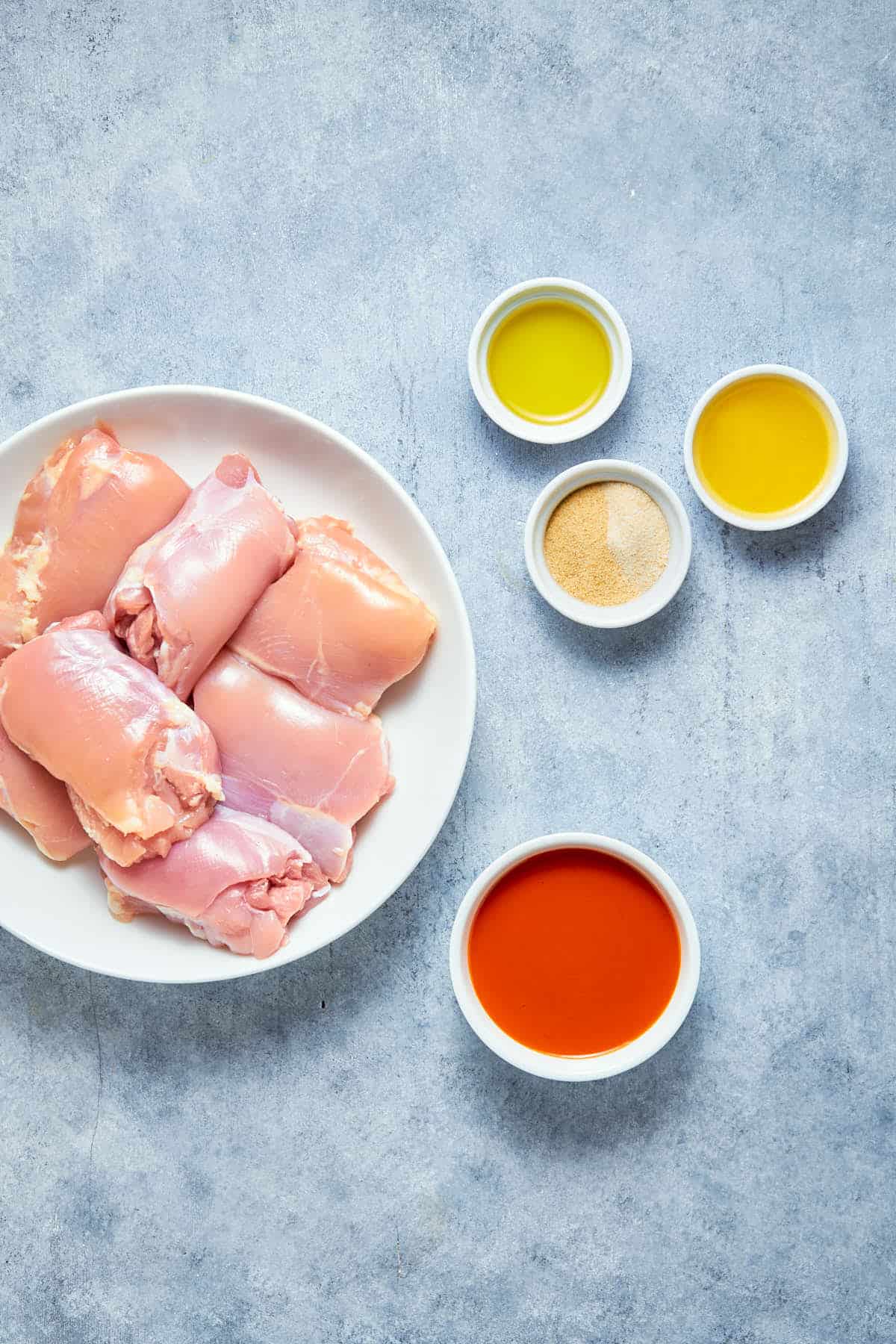 Ingredients to make buffalo chicken thighs.