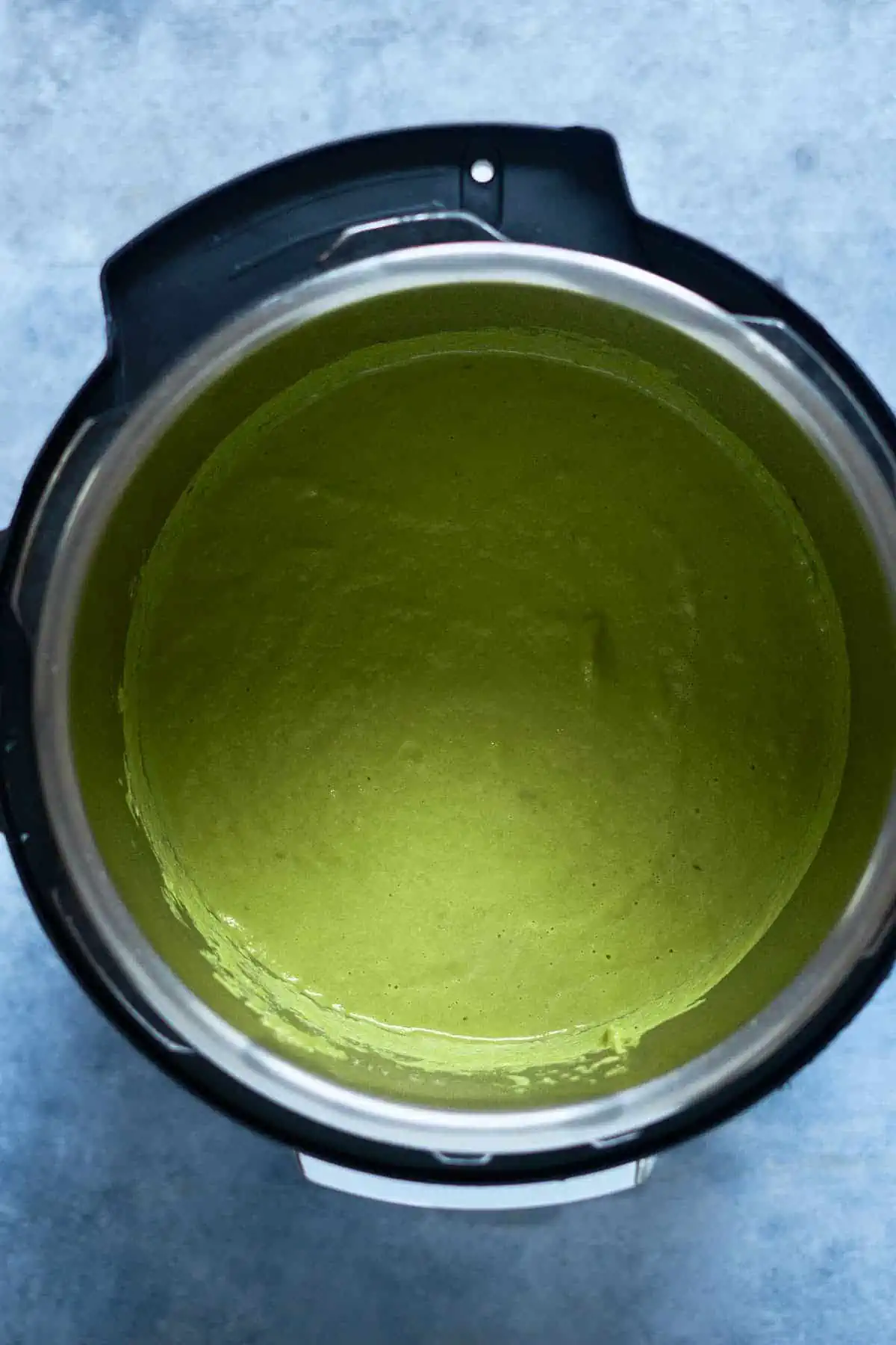 Cream of asparagus soup in the instant pot after blending.
