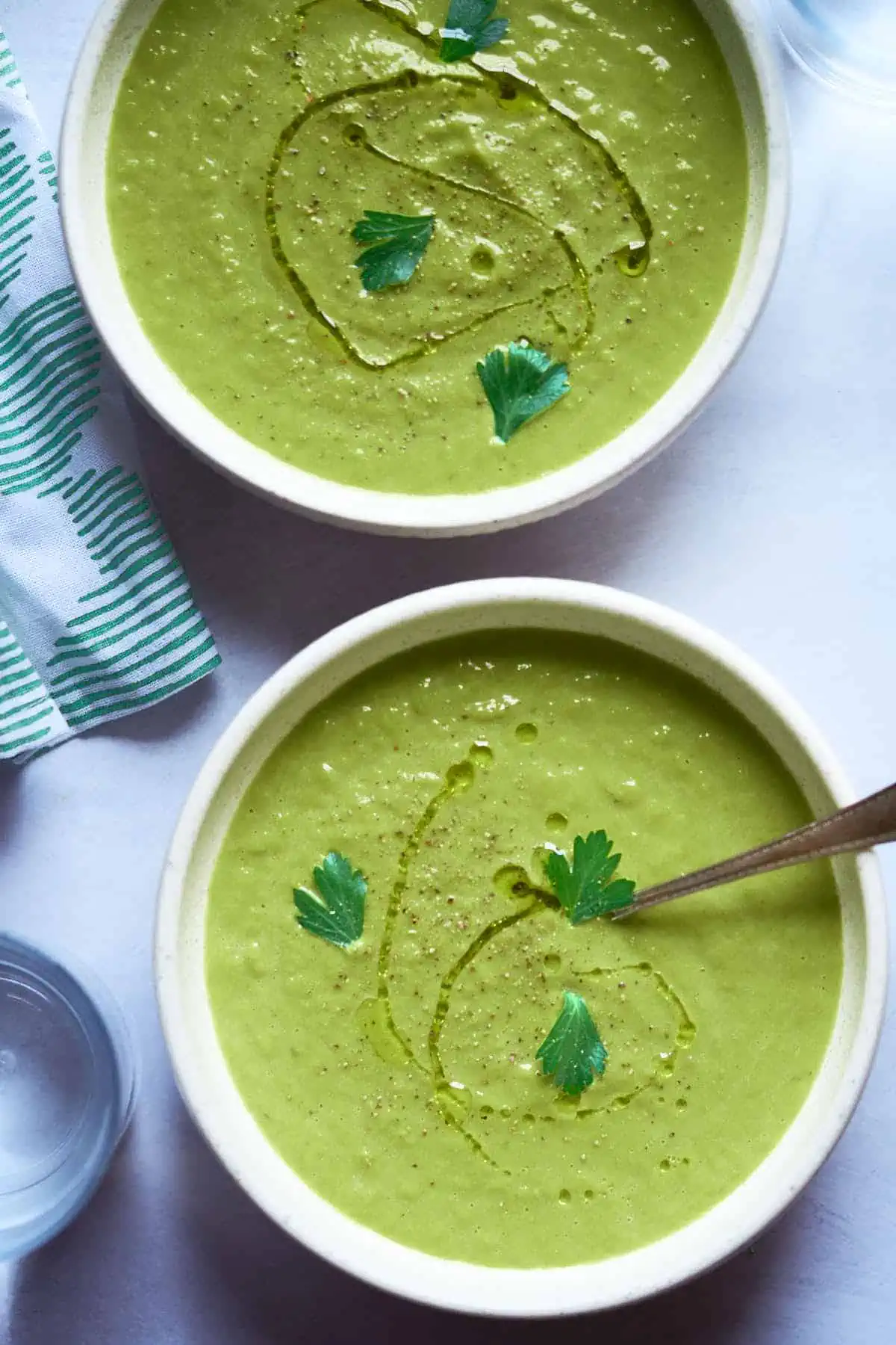 Amazing green soup garnished with fresh herbs and drizzled with olive oil. Great for vegetarians and keto dieters.