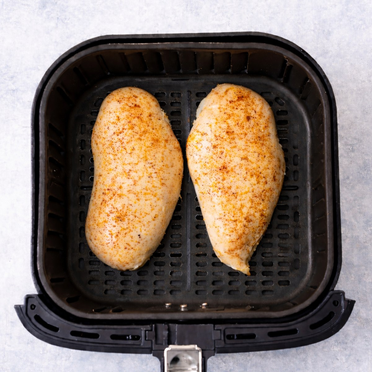 air fryer chicken breast cooked but pale soft and not crispy in basket