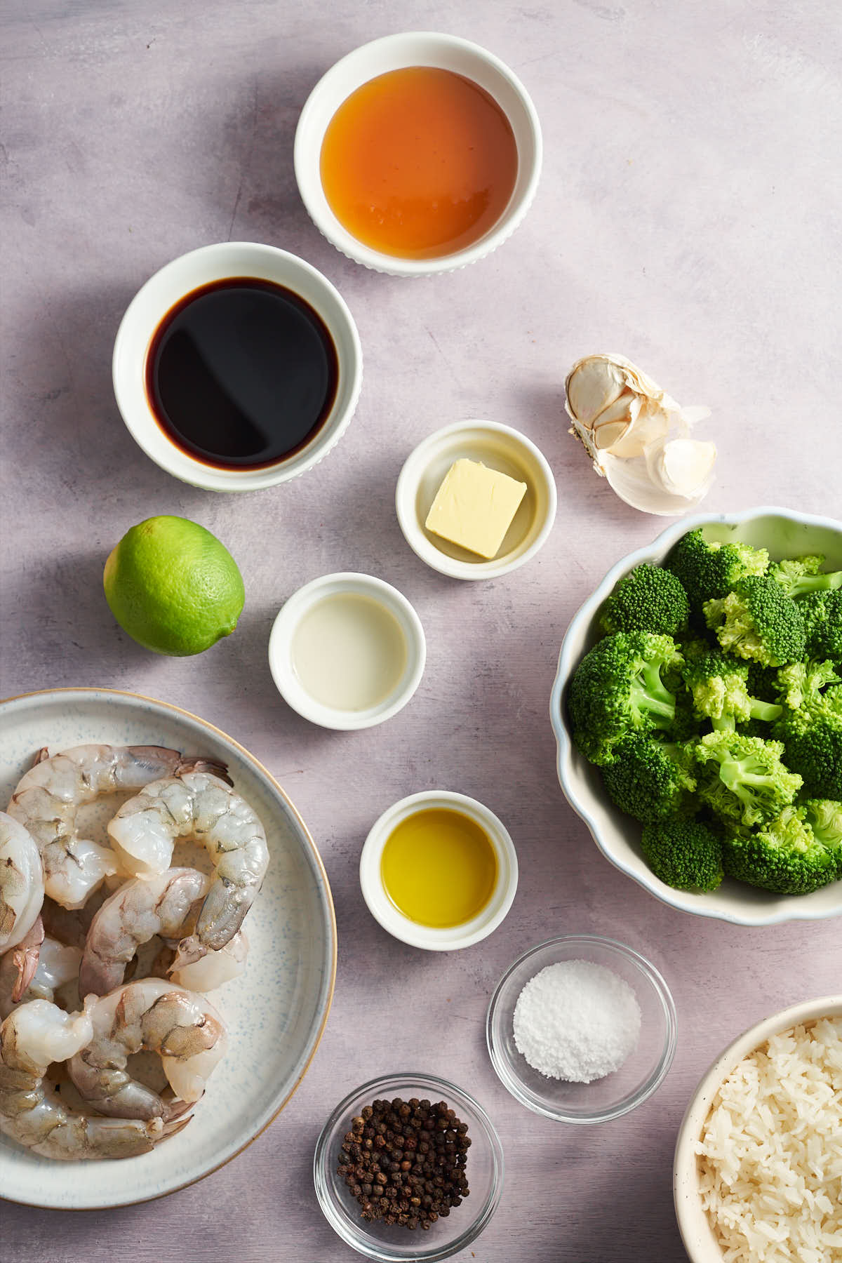 shrimp, broccoli, rice and honey garlic sauce ingredients arranged for the recipe.
