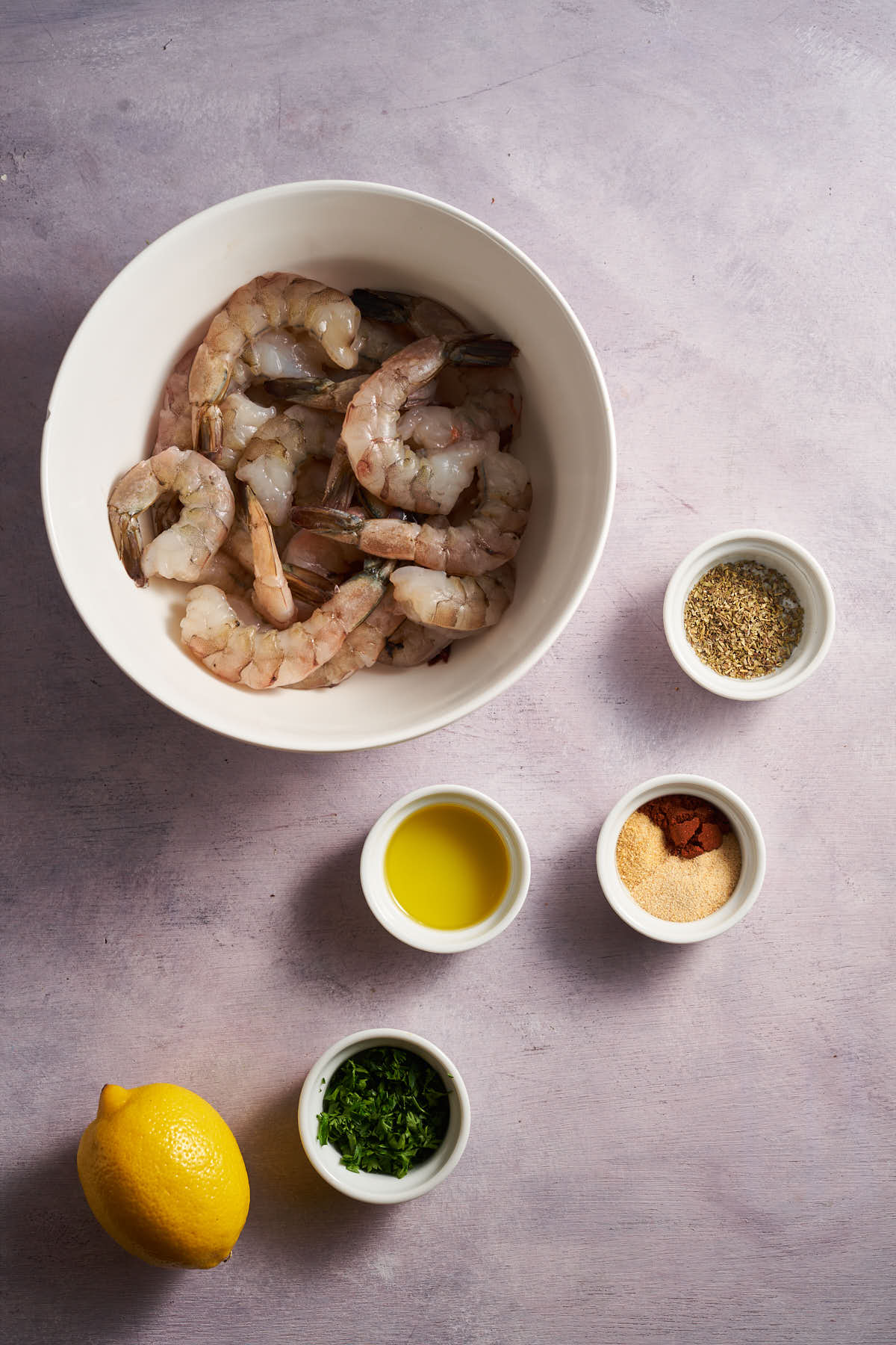Ingredients for air fryer shrimp skewers arranged together before cooking.